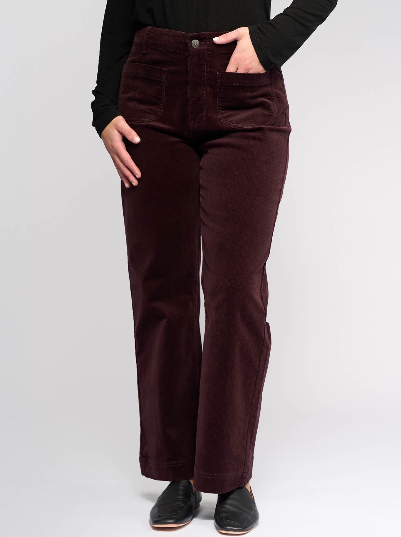 Image of a model wearing Pants. Productname: Vassalli Ankle Grazier Cord Pant in Merlot colour by brand - Vassalli