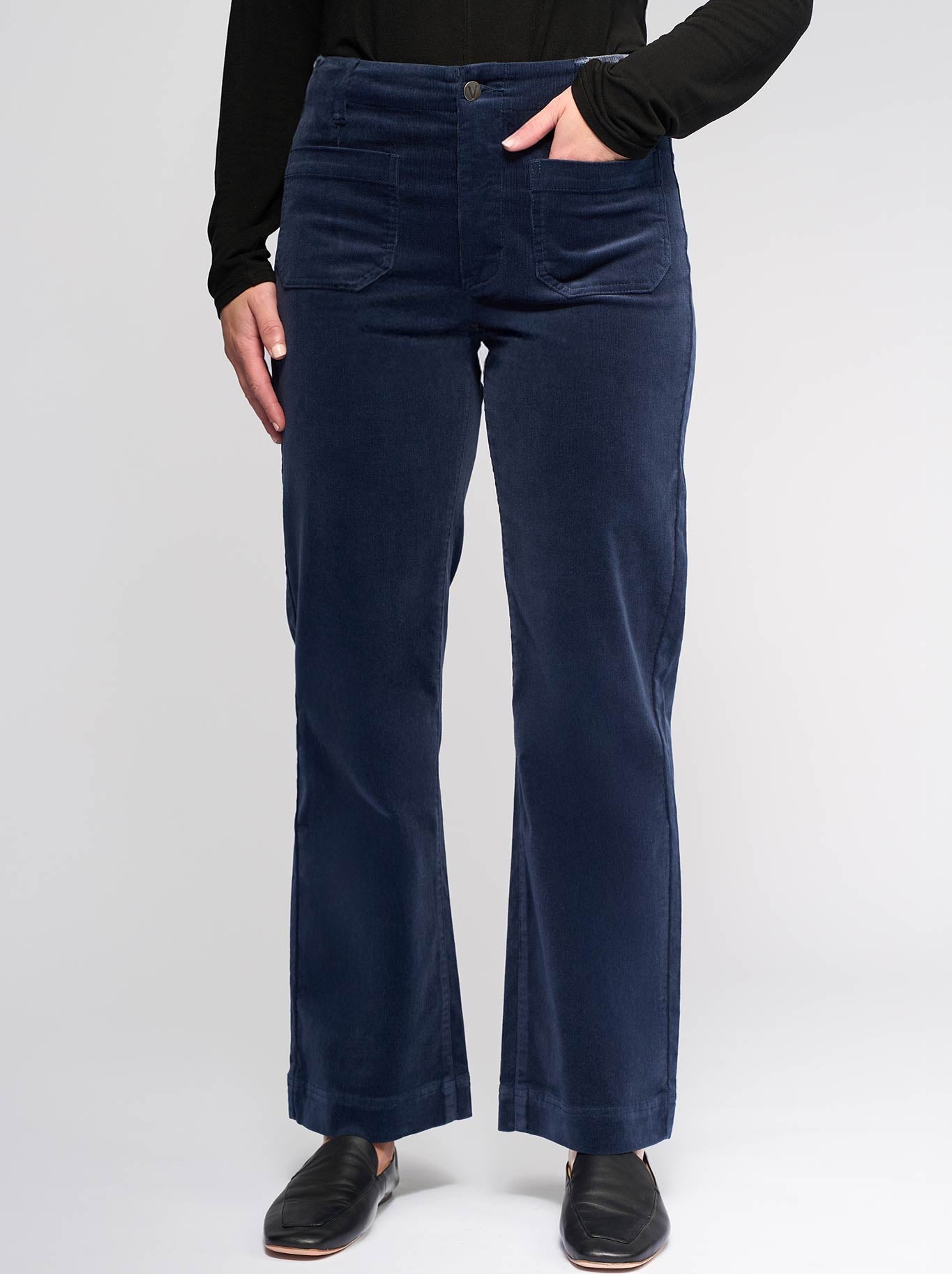 Image of a model wearing Pants. Product name - Vassalli Ankle Grazer Cord Pant in Slate colour by brand - Vassalli