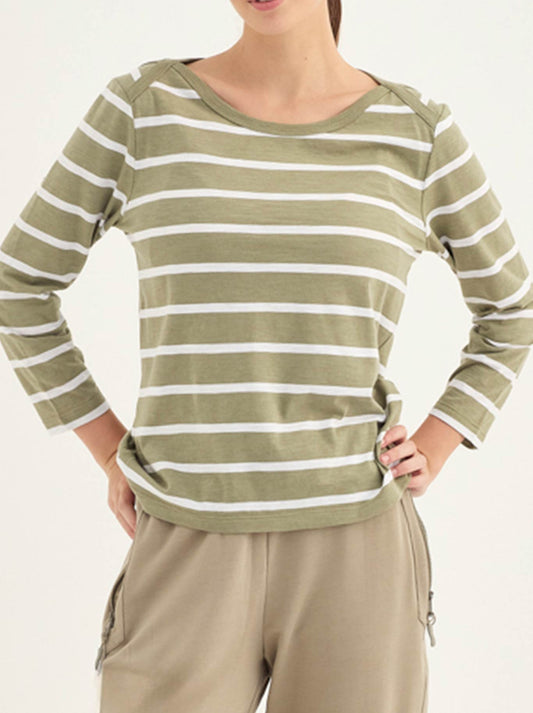Image of a model wearing Tops. Product name - Verge Spencer Top in Sage colour by brand - Verge