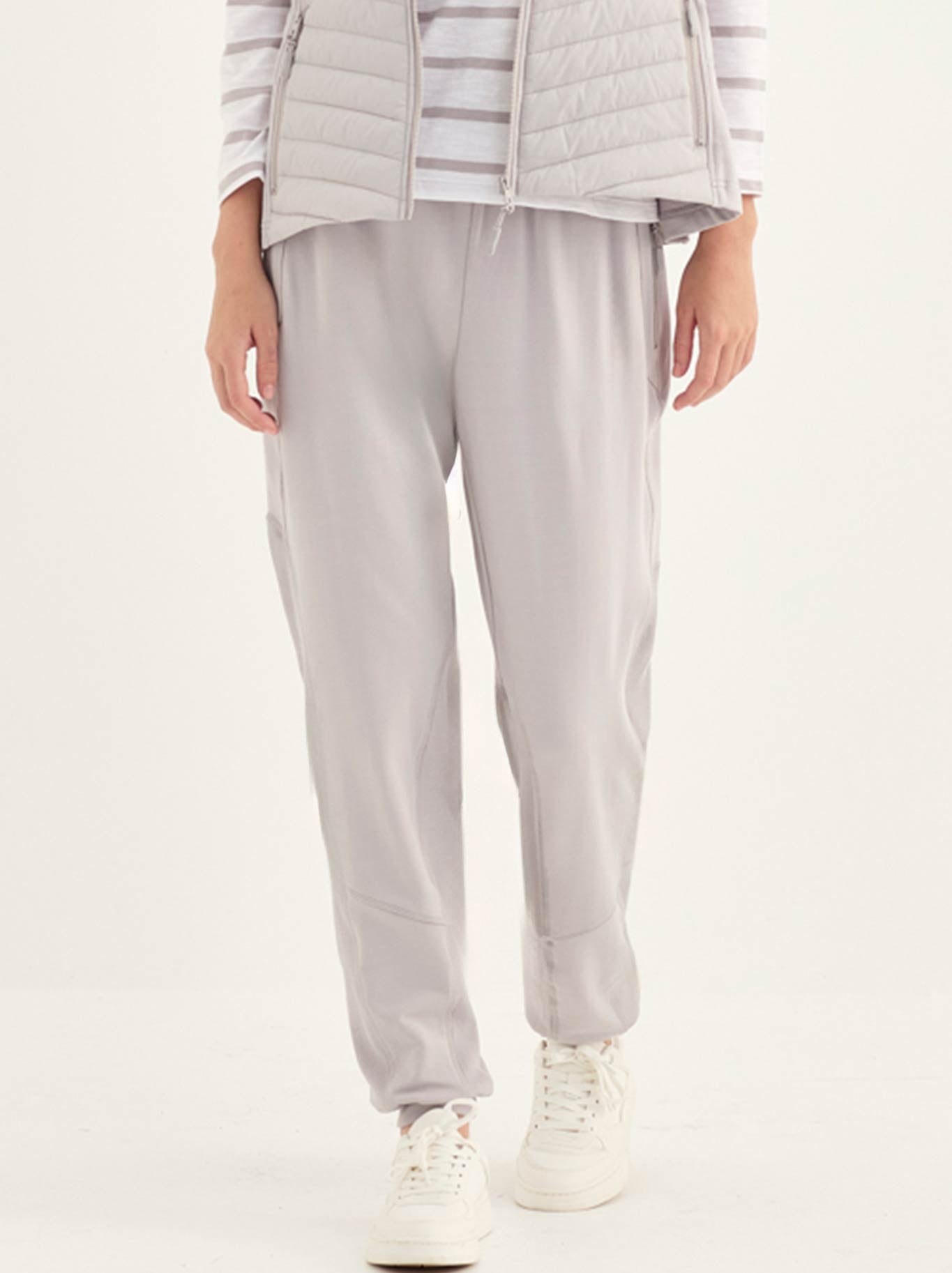 Image of a model wearing Pants. Product name - Verge Award Pant in Silver colour by brand - Verge