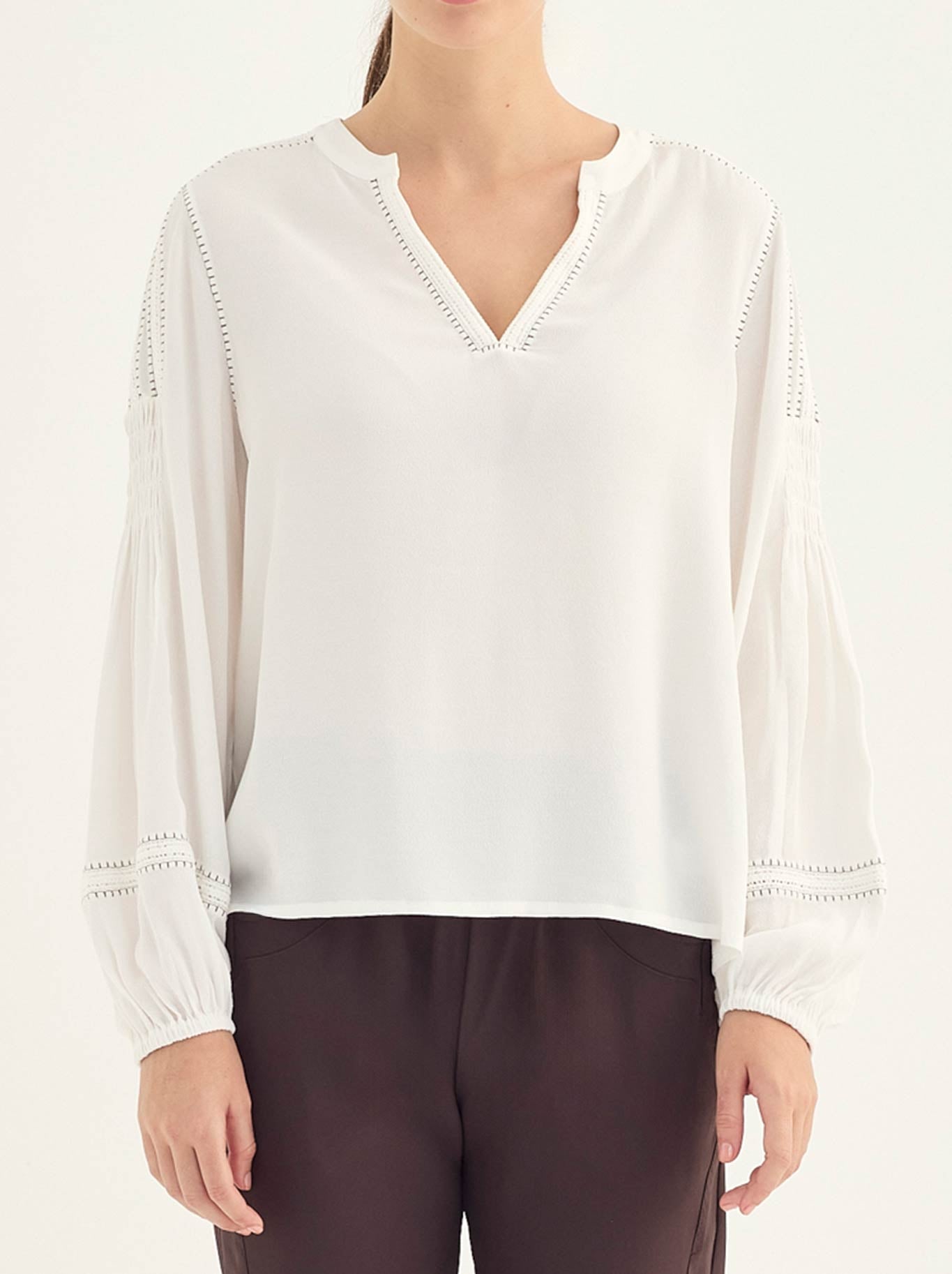 Image of a model wearing Tops. Product name - Verge Myra Blouse in Chalk colour by brand - Verge