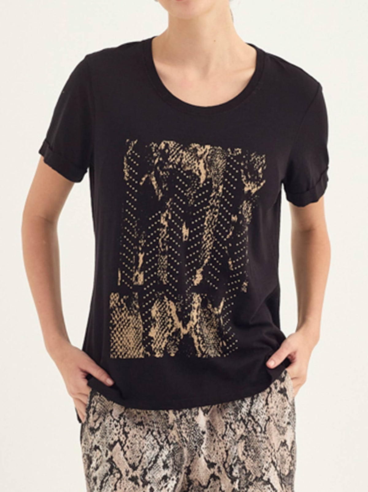 Image of a model wearing Tops. Product name - Verge Hallie Top in Black colour by brand - Verge