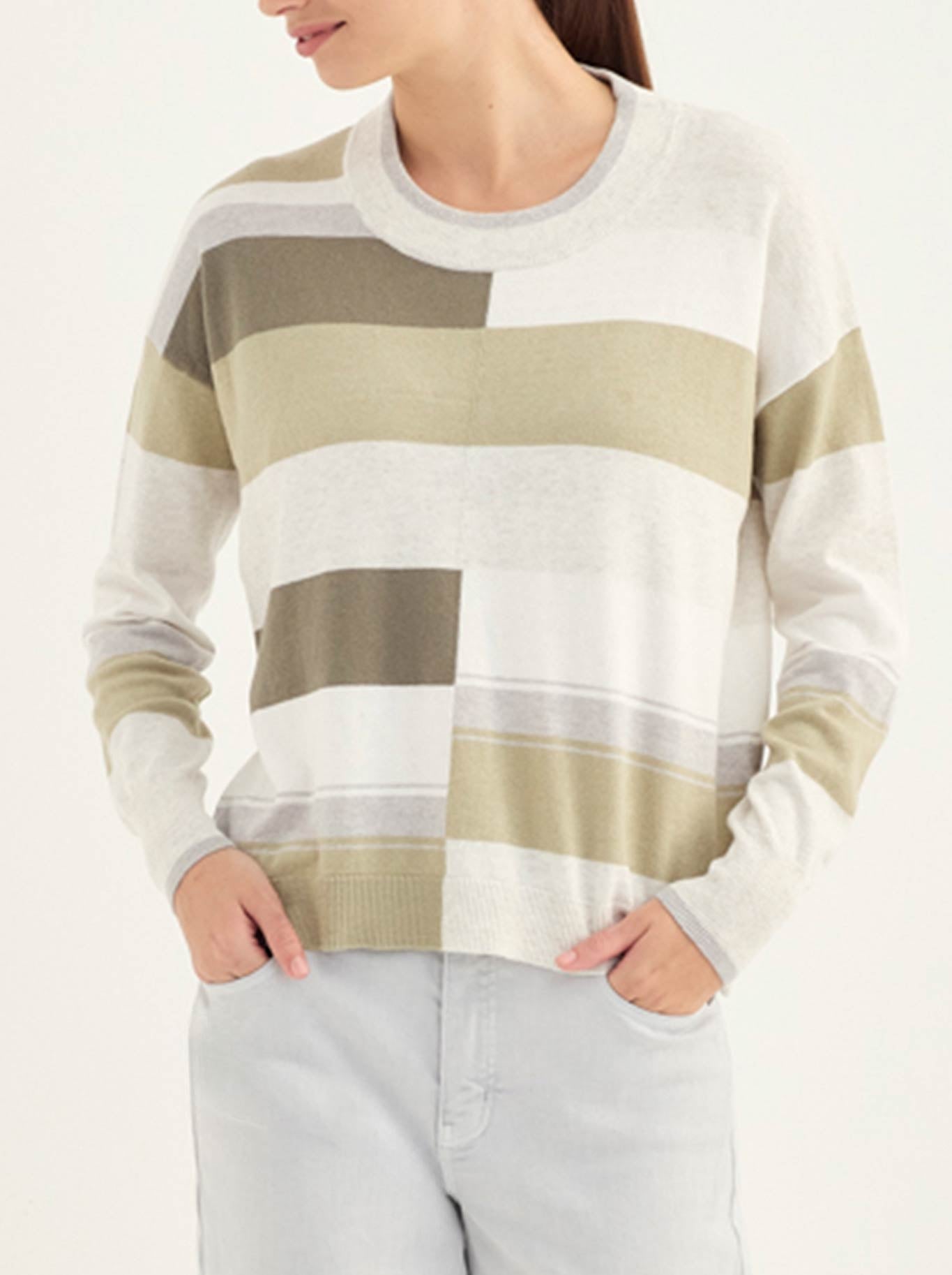 Image of a model wearing Outerwear. Product name - Verge Appeal Sweater in Sage colour by brand - Verge