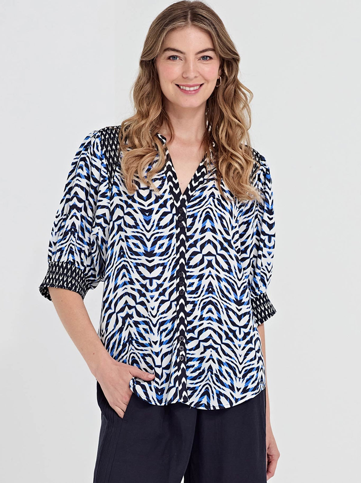 Image of a model wearing Tops. Product name - Verge Nova Blouse in Ink colour by brand - Verge