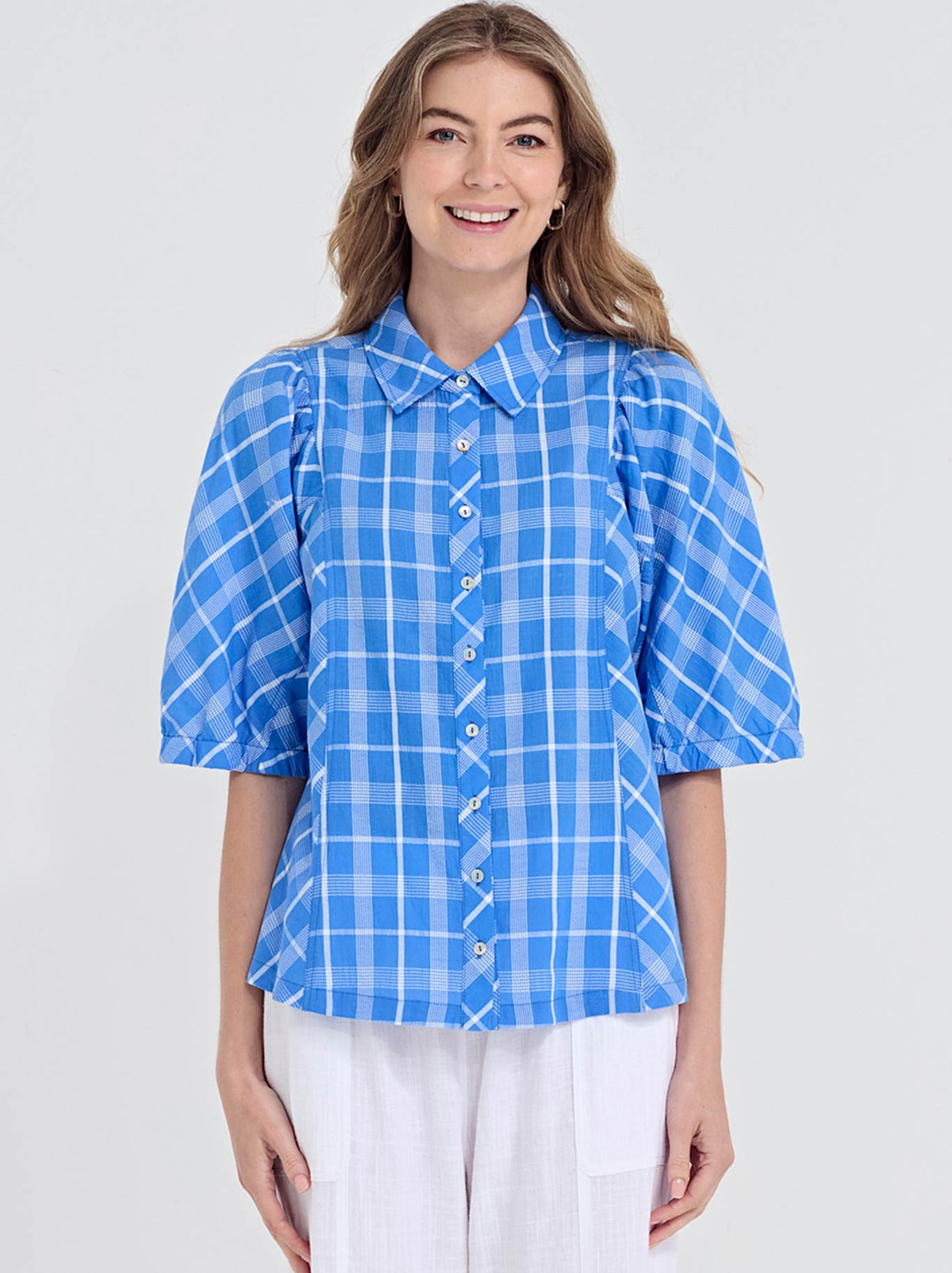 Image of a model wearing Tops. Product name - Verge Checkmate Shirt in Blue colour by brand - Verge