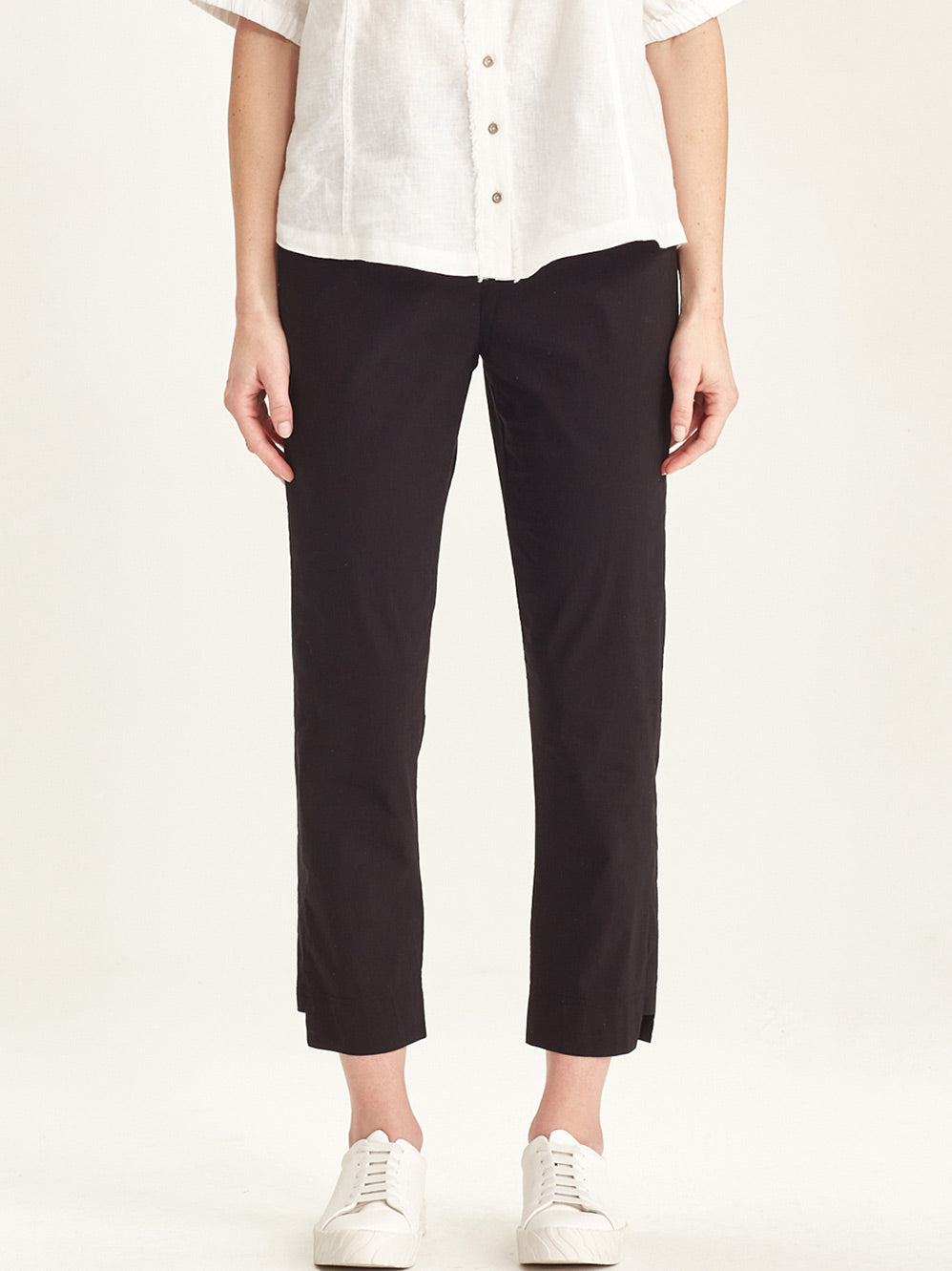 Image of a model wearing Pants. Productname: VERGE ACROBAT DESIREE PANT in Black colour by brand - Verge