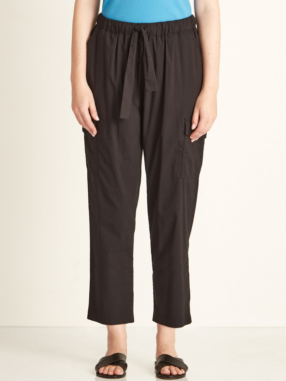 Image of a model wearing Pants. Productname: Verge Acrobat Soft Cargo in Black colour by brand - Verge