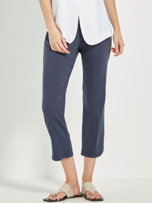 Image of a model wearing Pants. Productname: Verge Acrobat Rivet Pant in Denim Marle colour by brand - Verge