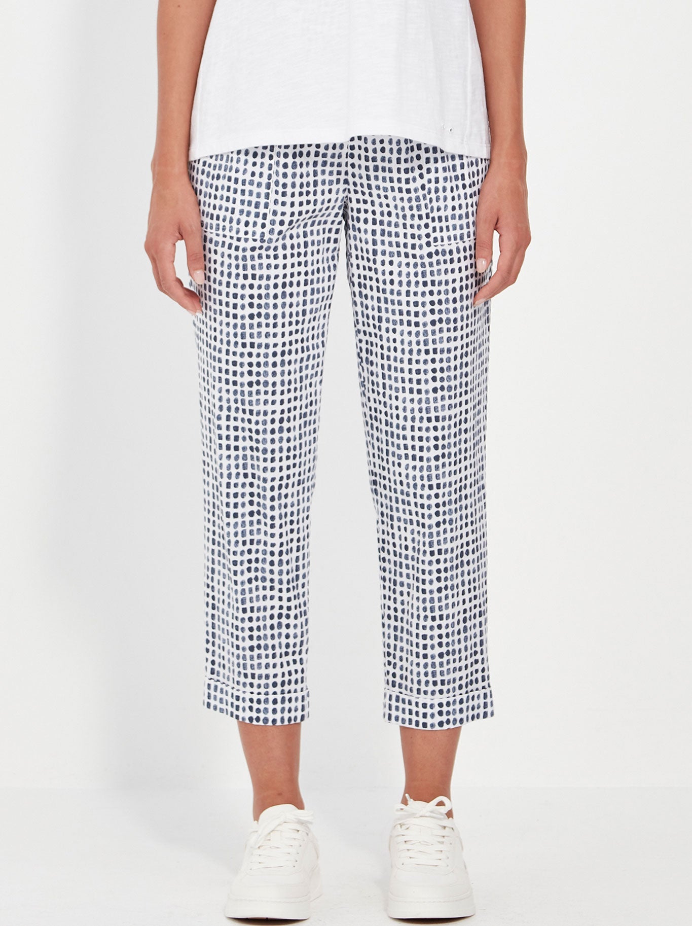 Image of a model wearing Pants. Productname: Verge Acrobat Tile Essex Pant in Denim Print colour by brand - Verge
