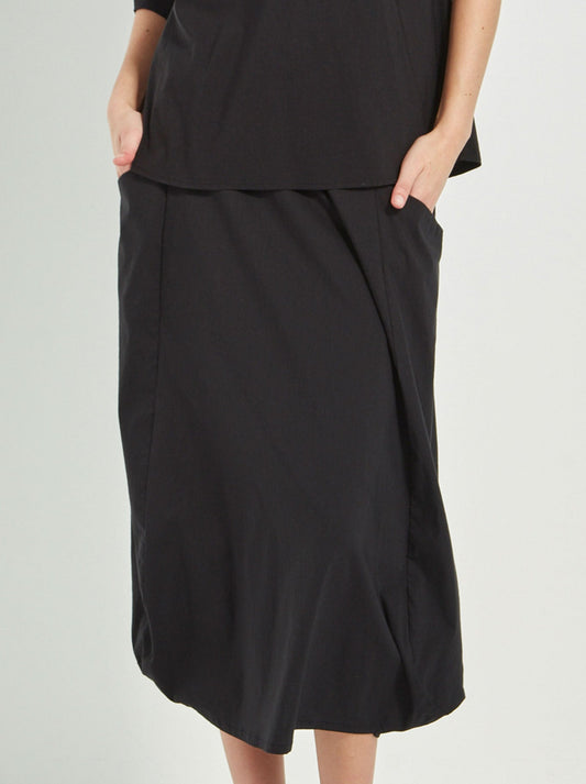 Image of a model wearing Skirts. Productname: VERGE ACROBAT EMI SKIRT in Black colour by brand - Verge