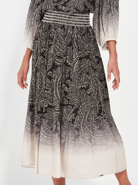 Image of a model wearing Skirts. Productname: VERGE AMARA SKIRT in Print colour by brand - Verge