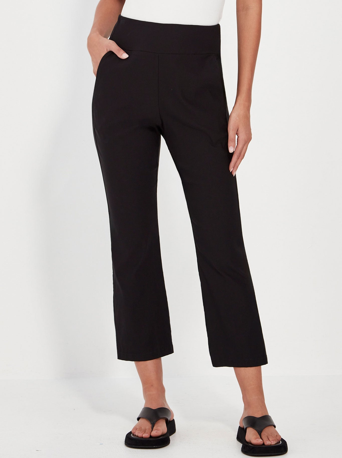 Image of a model wearing Pants. Productname: VERGE SCOUT PANT in Black colour by brand - Verge