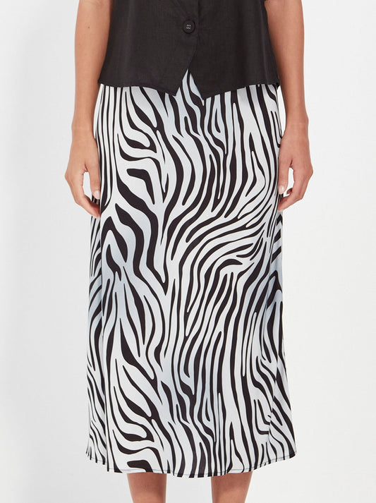 Image of a model wearing Skirts. Productname: Verge Casey Skirt in Print colour by brand - Verge