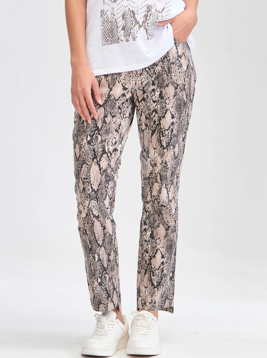 Image of a model wearing Pants. Product name - Verge Acrobat Serpent Jean in Print colour by brand - Verge