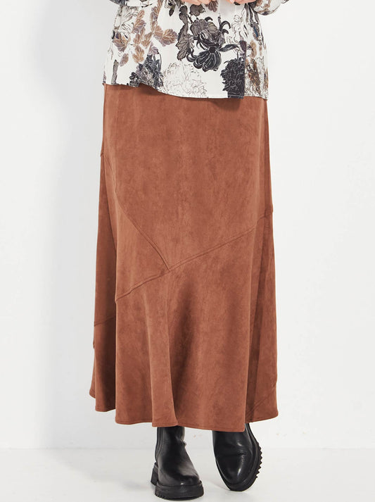 Image of a model wearing Skirts. Product name - VERGE ALINA SKIRT in Caramel colour by brand - Verge