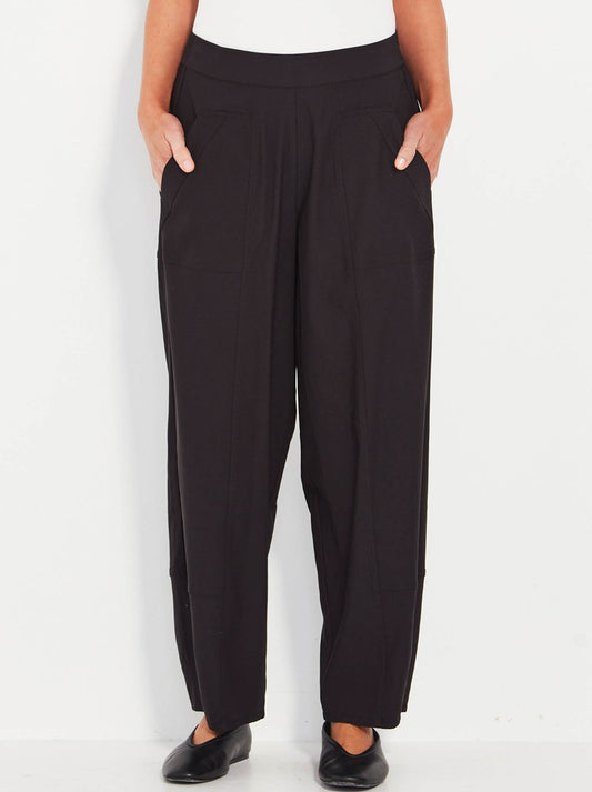 Image of a model wearing Pants. Productname: Verge Homeland Pant in Black colour by brand - Verge