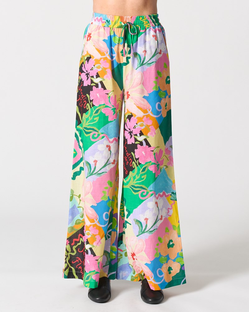 Image of a model wearing Pants. Product name - Vermont Pant in Jardin Des Fleurs colour by brand - Walnut Melbourne