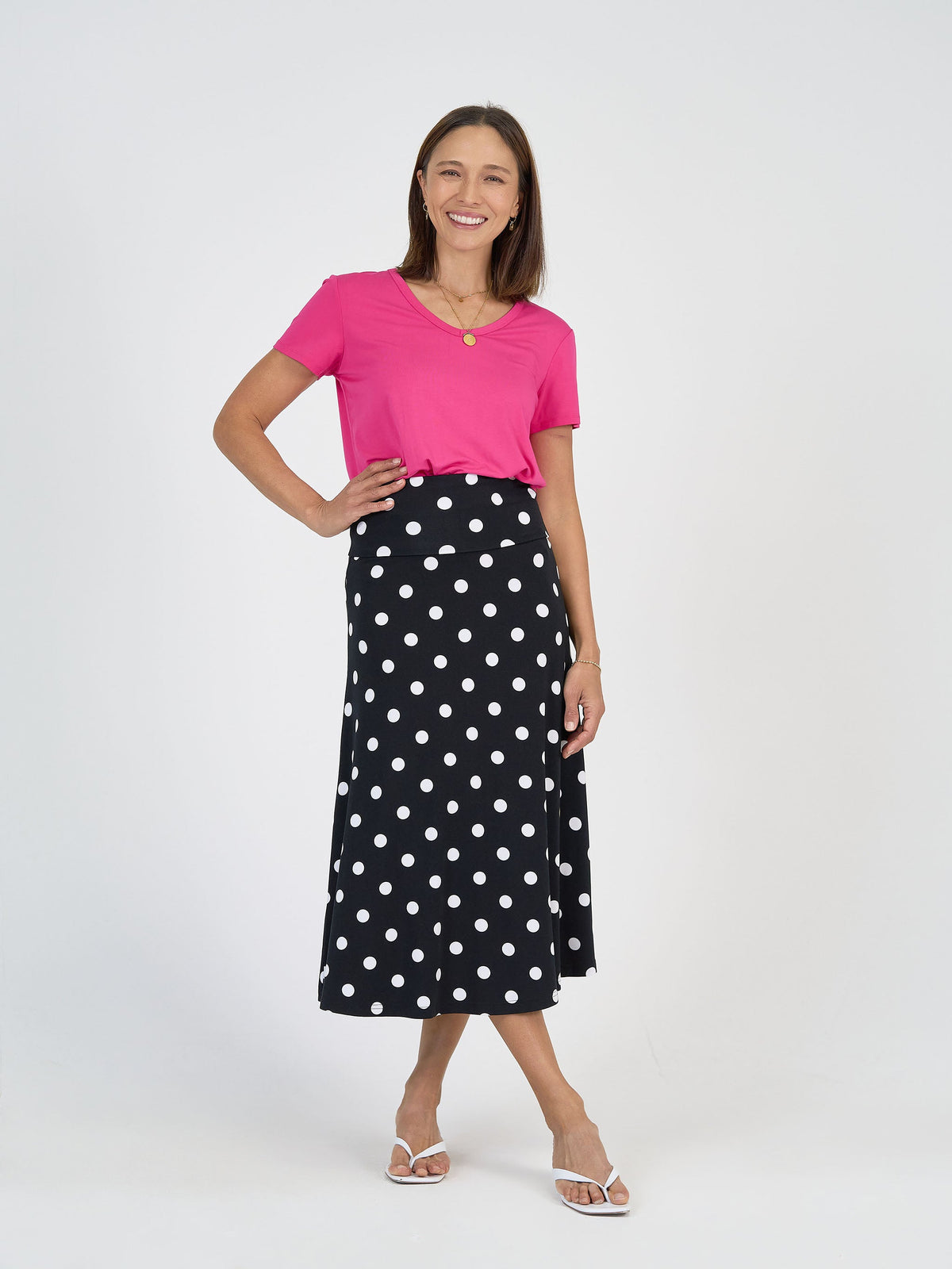 Image of a model wearing Tops. Product name - Veronica Bamboo V-Neck T-Shirt Fuschia in Fuschia colour by brand - Lou Lou
