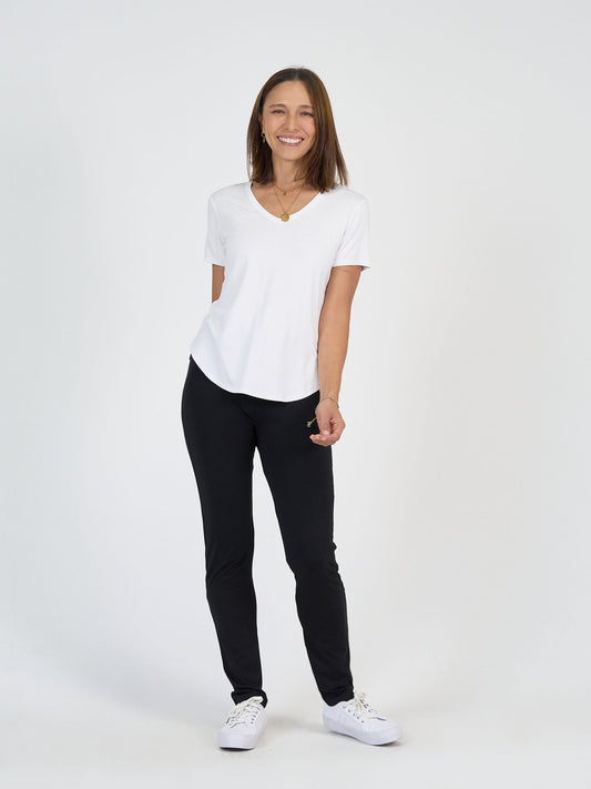 Image of a model wearing Pants. Product name - Warwick Bamboo Fold Over Waist Pant in Black colour by brand - Lou Lou