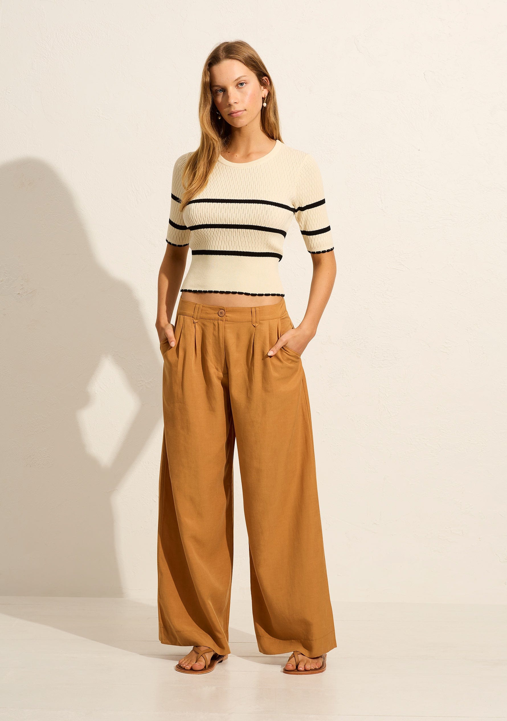 Image of a model wearing Pants. Productname: Auguste The Label Hensley Pant in Tan/Brown colour by brand - Auguste The Label