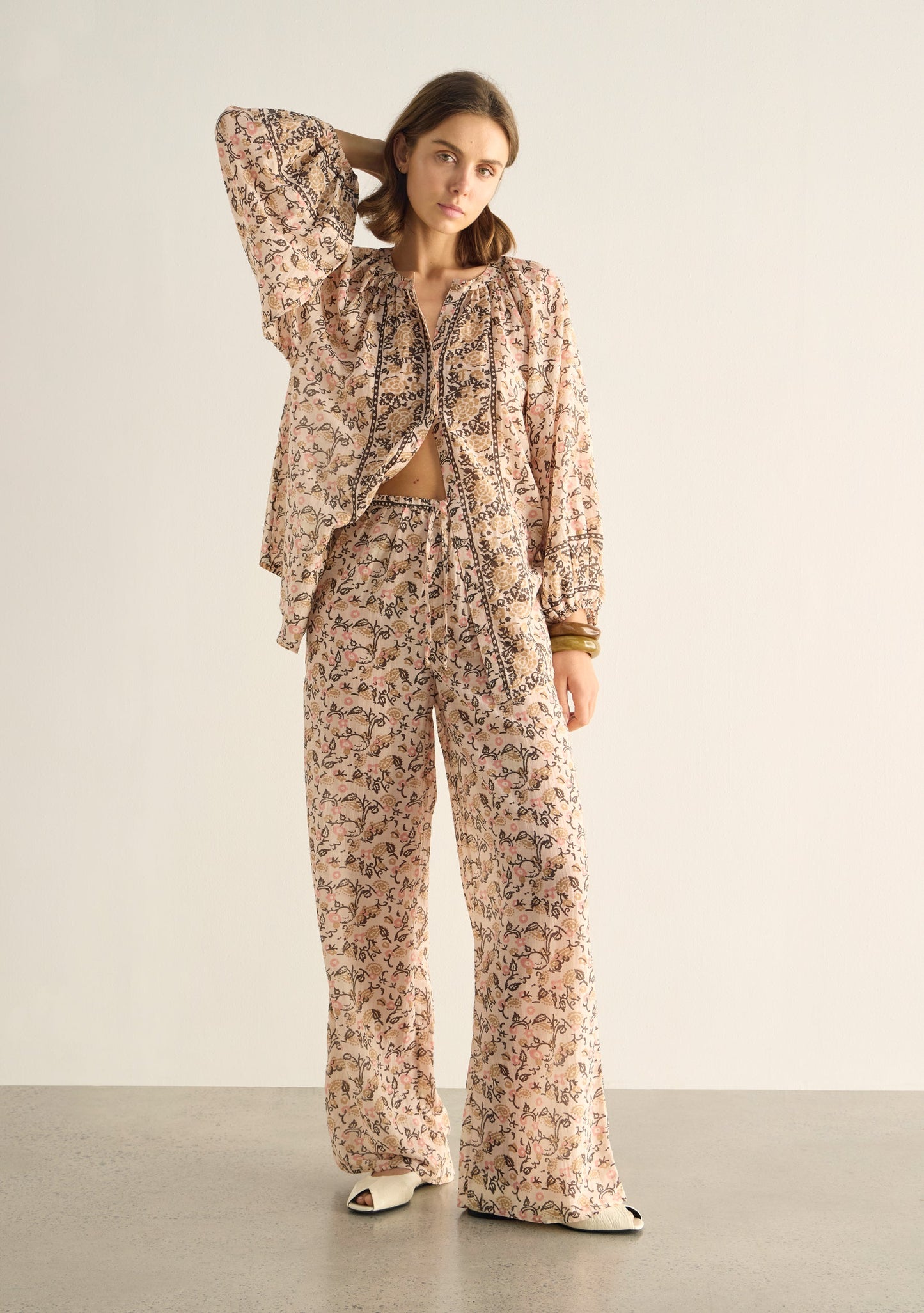 Image of a model wearing Pants. Productname: Auguste The Label Martha Pant in White colour by brand - Auguste The Label