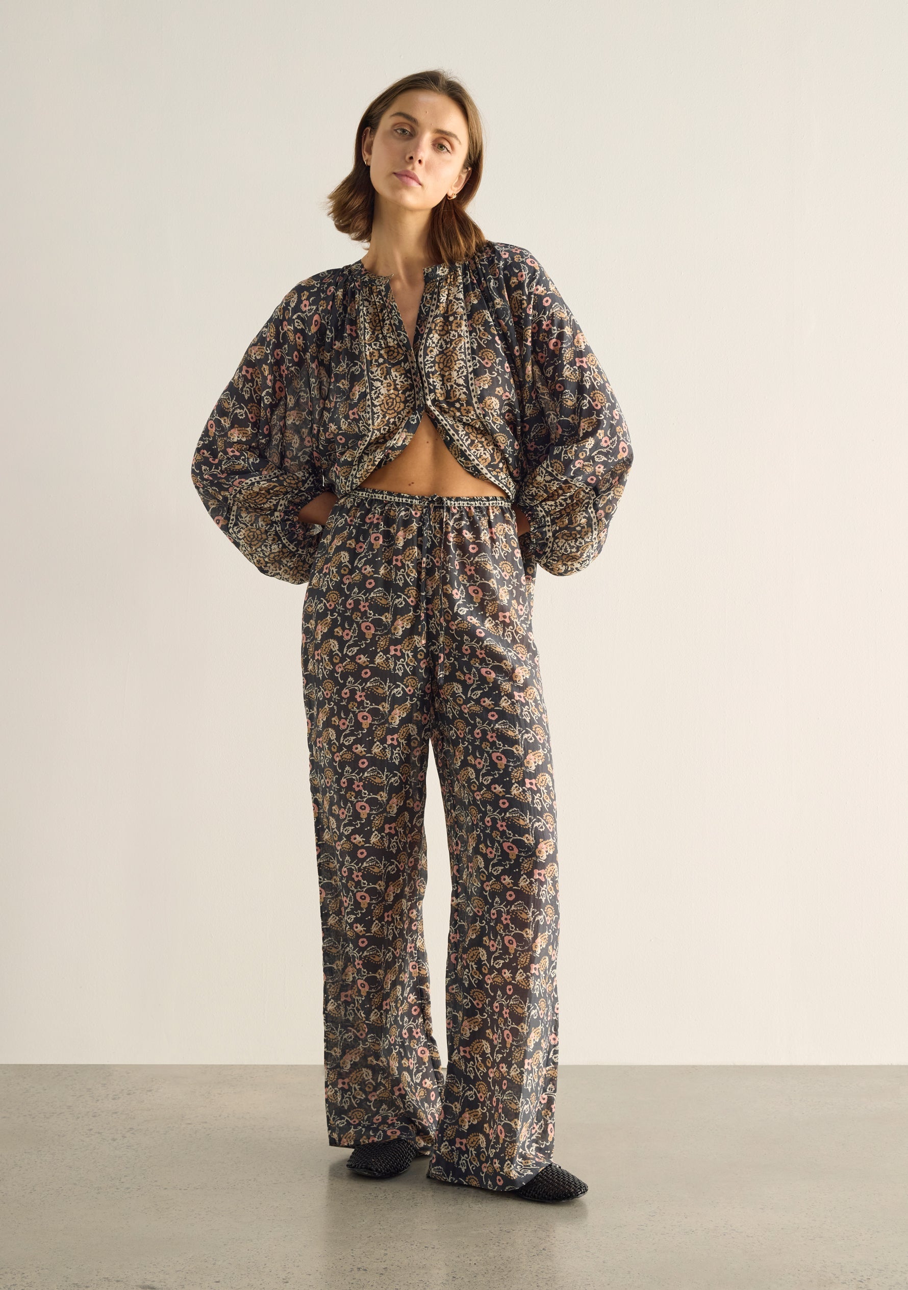 Image of a model wearing Pants. Productname: Auguste The Label Martha Pant in Black colour by brand - Auguste The Label