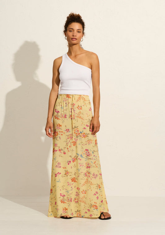 Image of a model wearing Skirts. Productname: Auguste The Label Flavia Maxi Skirt in Yellow/Orange colour by brand - Auguste The Label