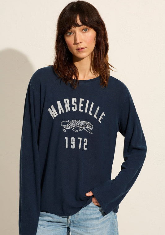 Image of a model wearing Tops. Productname: Auguste The Label Marseille North Long Sleeve Tee in Blue colour by brand - Auguste The Label