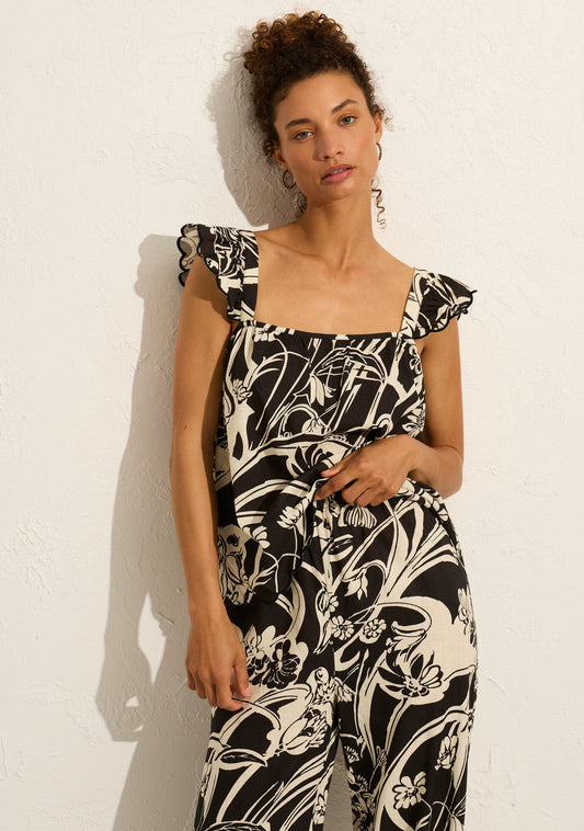 Image of a model wearing Tops. Productname: Auguste The Label Amisyn Blouse in Black colour by brand - Auguste The Label