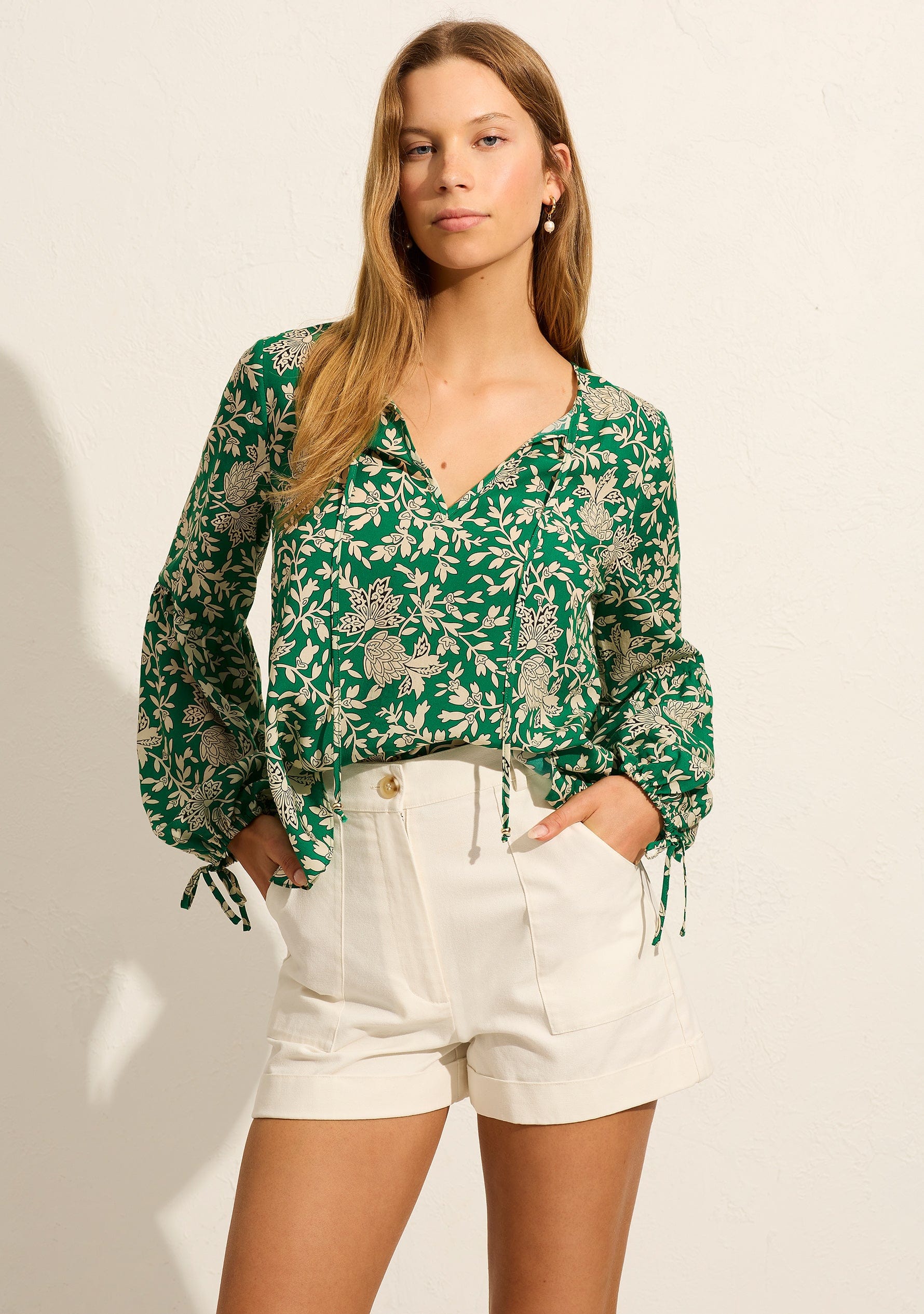 Image of a model wearing Tops. Productname: Auguste The Label Lennox Blouse in Green colour by brand - Auguste The Label