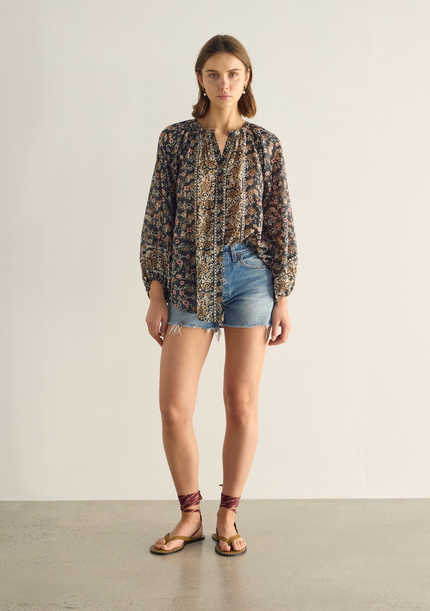 Image of a model wearing Tops. Productname: Auguste The Label Hayley Blouse in Black colour by brand - Auguste The Label