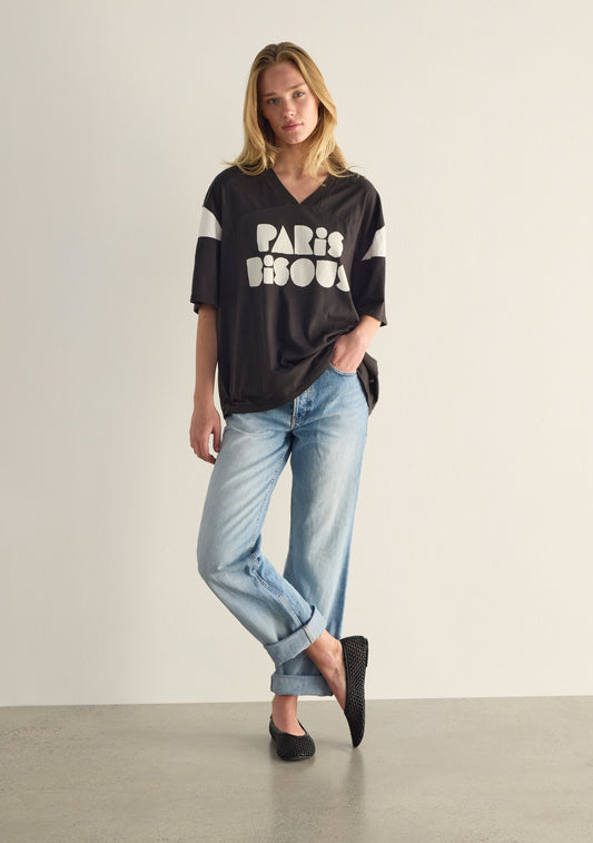 Image of a model wearing Tops. Productname: Auguste The Label Paris Bisous Oscar Tee in Black colour by brand - Auguste The Label