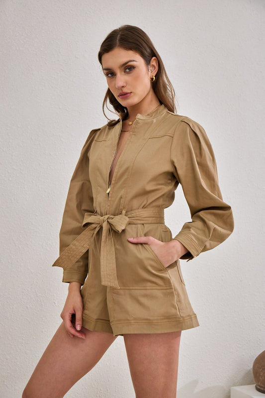 Image of a model wearing Outerwear. Productname: Heychic Asher Zip Front Long Sleeve Playsuit in Mocha colour by brand - Heychic