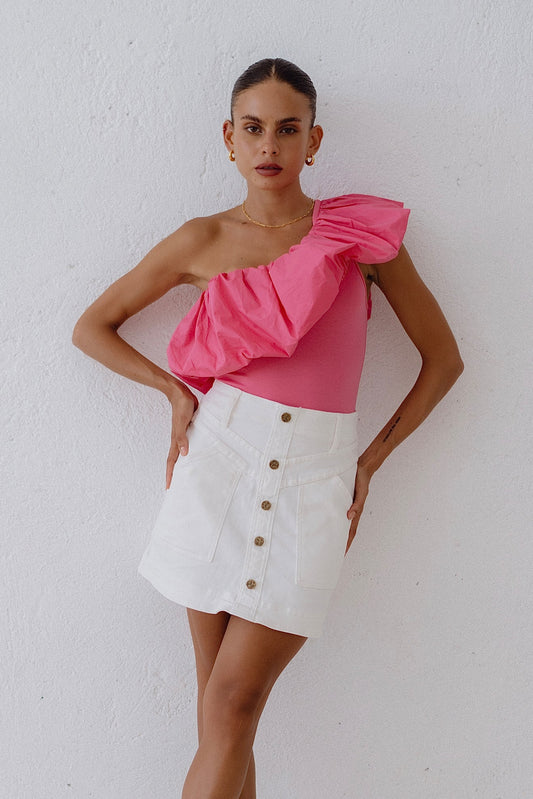 Image of a model wearing Pants. Productname: Heychic Hayden Denim A-Line Mini Skirt in White colour by brand - Heychic