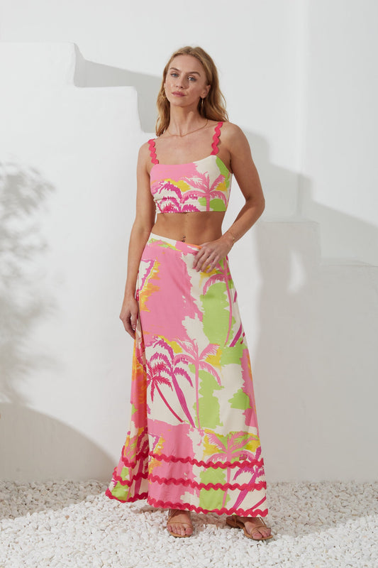 Image of a model wearing Pants. Productname: Heychic Paradisio Tropical Ric Rac Maxi Skirt in Pink colour by brand - Heychic