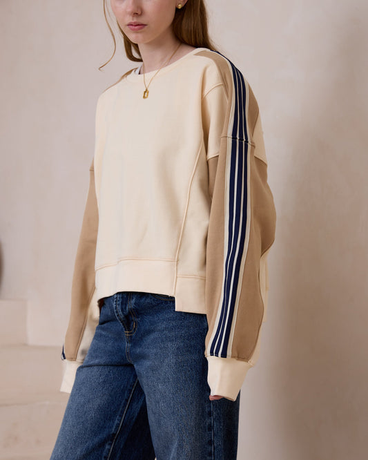 Image of a model wearing Tops. Productname: Heychic Alex Beige Contrast Stripe Sweatshirt in Cream colour by brand - Heychic