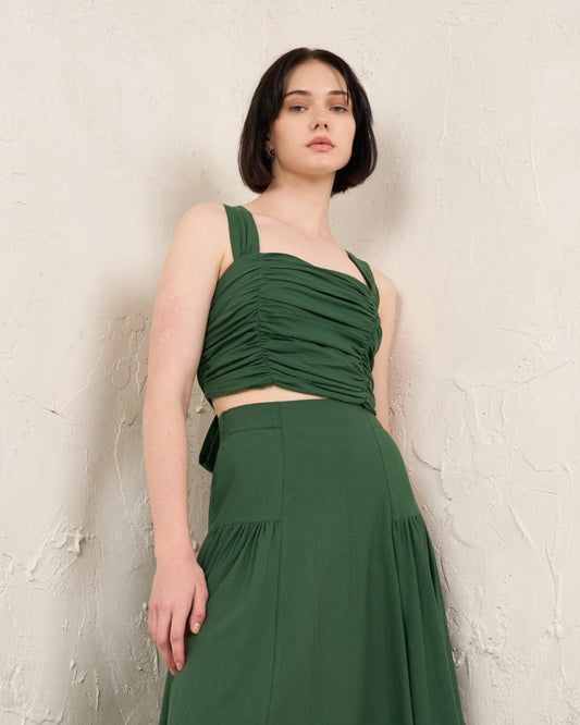 Image of a model wearing Tops. Productname: HEYCHIC Kira Ruched Top in Green colour by brand - HEYCHIC
