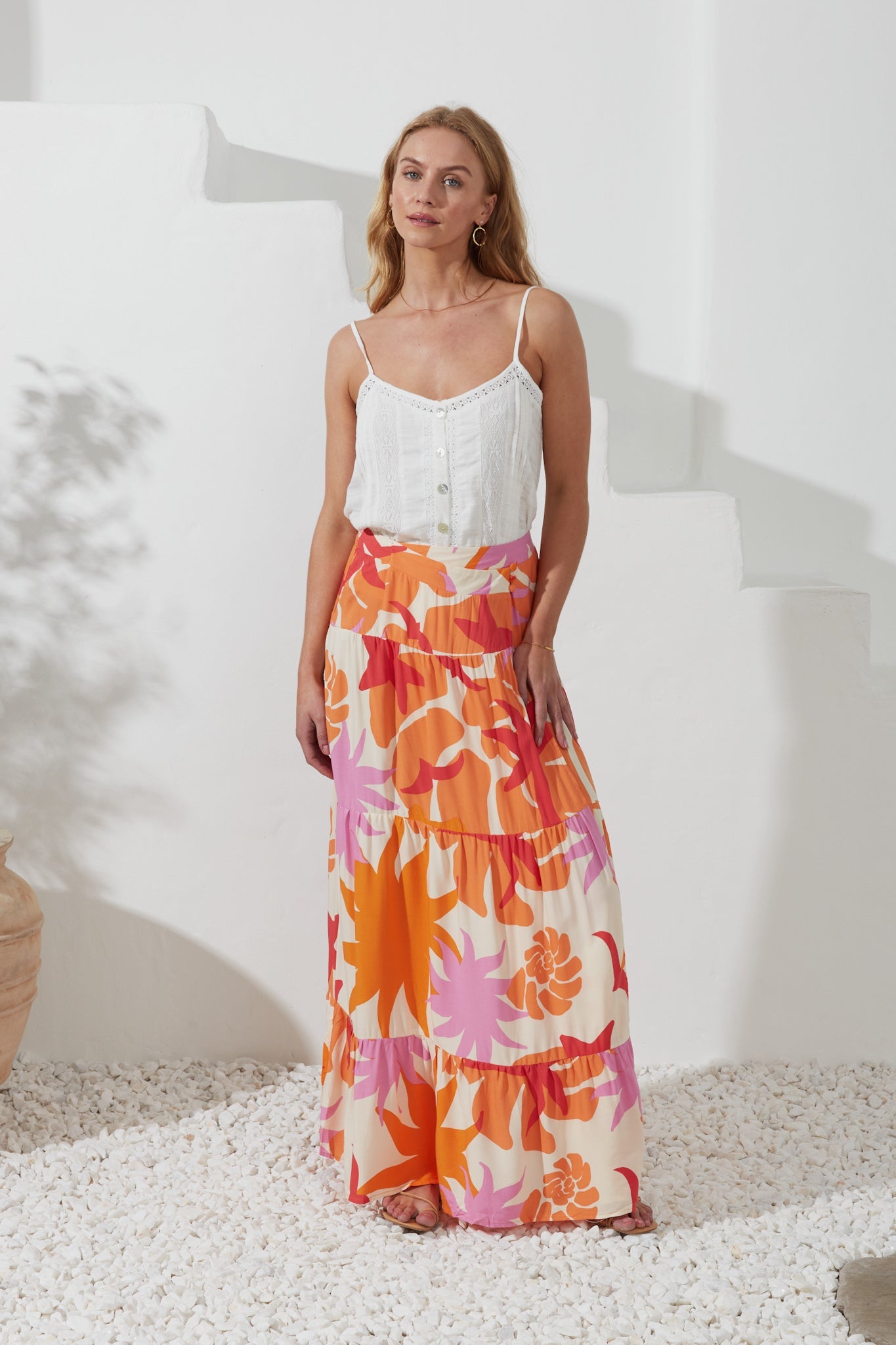 Image of a model wearing Pants. Productname: Heychic Calinda Abstract Tiered Maxi Skirt in Orange colour by brand - Heychic
