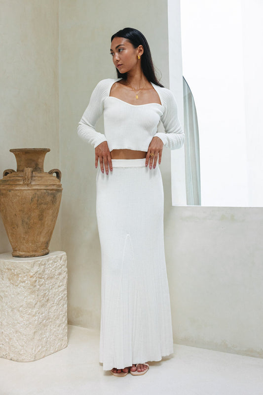 Image of a model wearing Pants. Productname: Heychic Valerie Knit Maxi Skirt in White colour by brand - Heychic