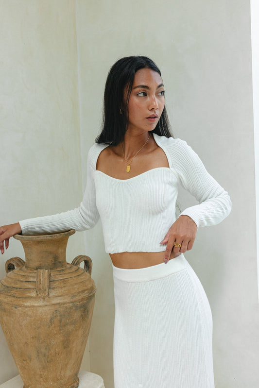 Image of a model wearing Tops. Productname: Heychic Valerie Long Sleeve Knit Top in White colour by brand - Heychic