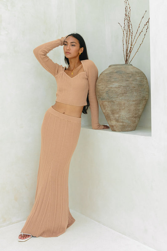 Image of a model wearing Skirts. Product name - Valerie Mocha Knit Maxi Skirt in Skirt colour by brand - Heychic