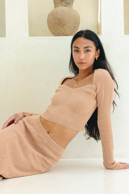 Image of a model wearing Tops. Product name - Valerie Mocha Long Sleeve Knit Top in Top colour by brand - Heychic