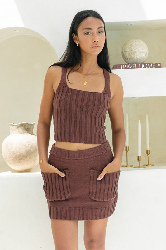 Image of a model wearing Pants. Productname: Heychic Alice Knit Mini Skirt in Brown colour by brand - Heychic