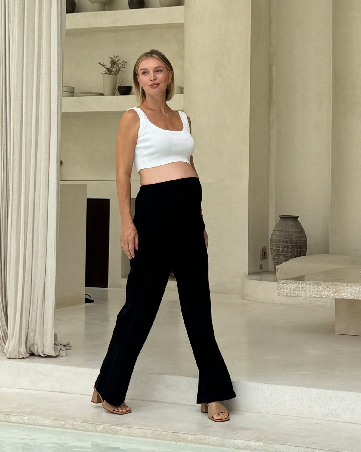 Image of a model wearing Pants. Product name - Pull-On Wide Leg Pants in 80Cm colour by brand - Soon Maternity
