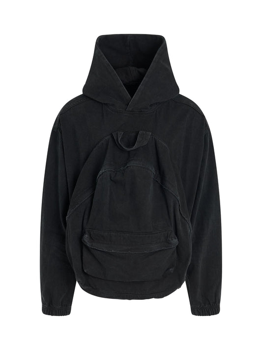 Image of a model wearing Outerwear. Productname: WE11DONE Bag Shaped Craft Denim Hoodie in BLACK colour by brand - WE11DONE