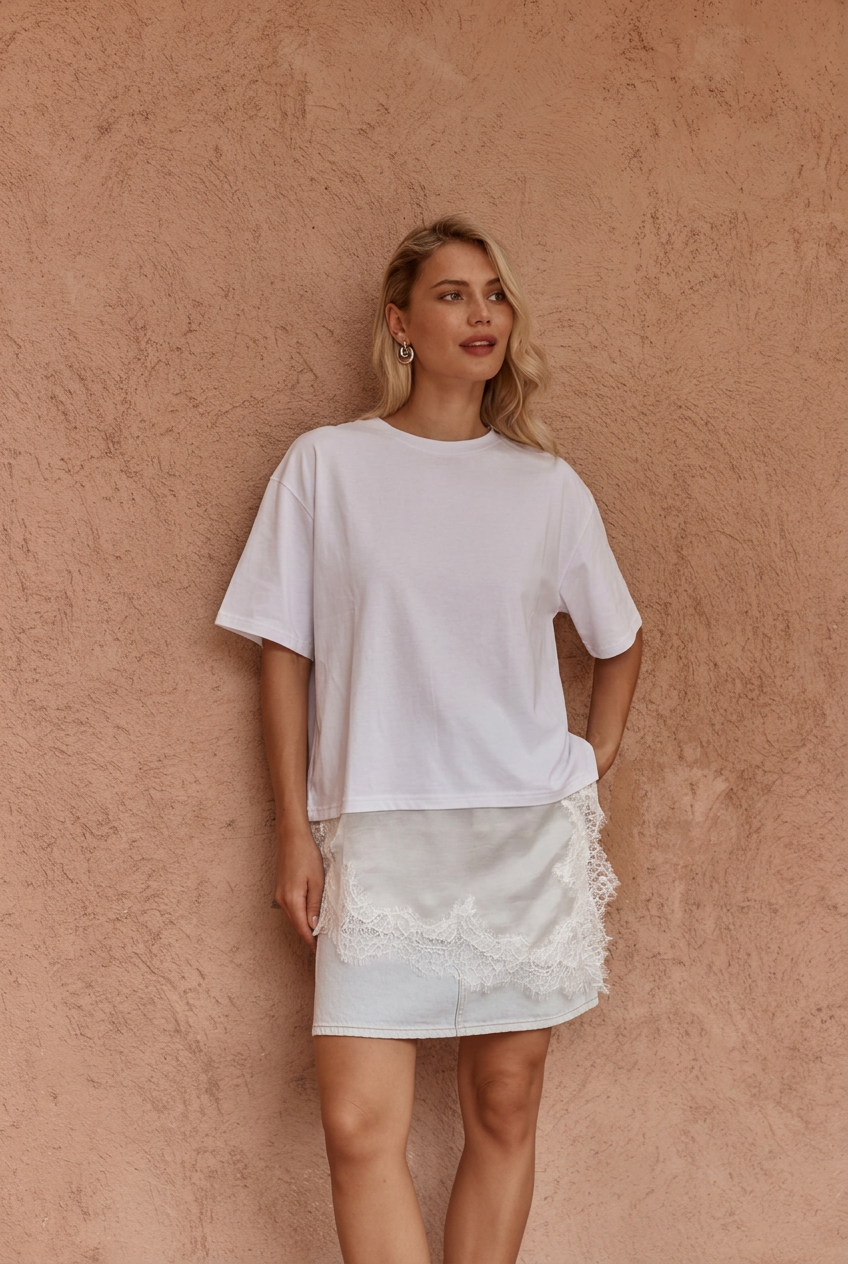 Image of a model wearing Tops. Product name - Arlo Jersey Lace Tee Ivory in Ivory colour by brand - Sass Clothing