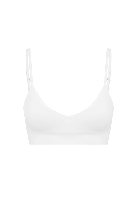 Image of a model wearing Tops. Product name - Jéan Bralette in White colour by brand - With Jéan