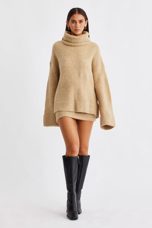 Image of a model wearing Skirts. Productname: SNDYS WINNIE MINI SKIRT in Beige colour by brand - SNDYS