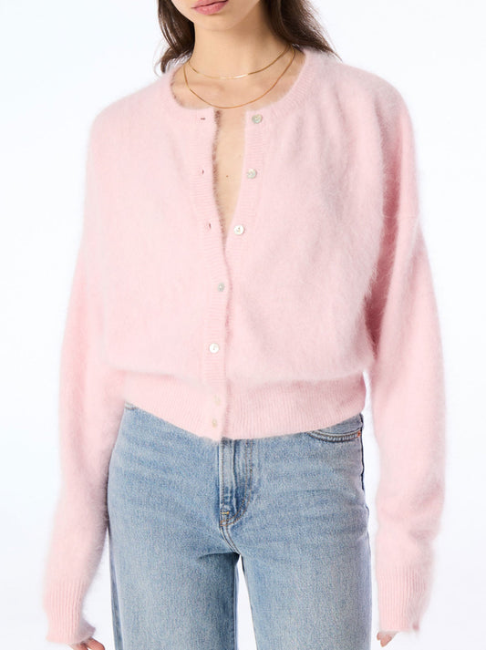 Image of a model wearing Outerwear. Productname: WORLD OF NOMADS FRANKIE CREW NECK CASHMERE CARDIGAN in Rosewater colour by brand - World Of Nomads