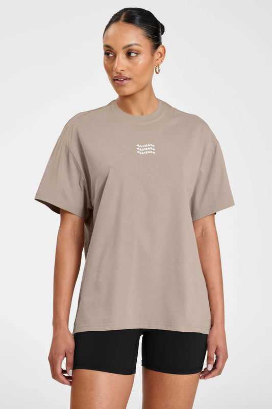 Image of T-Shirts. Product name - ALLFENIX Waves Logo Tee in Stone colour by brand - All Fenix